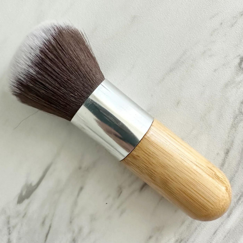 brush with bamboo handle for applying dry shampoo powder