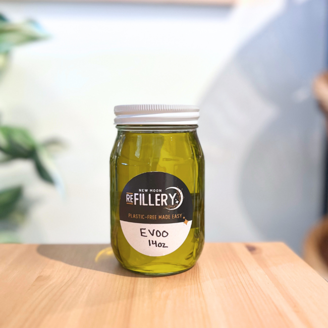Extra virgin olive oil in a glass mason jar