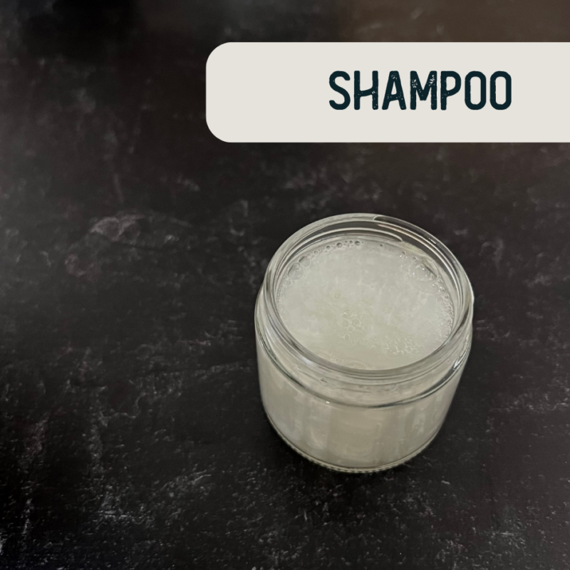 White shampoo in a small clear jar